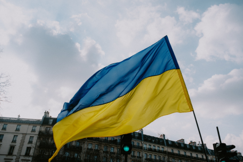 A picture of the Ukraine flag waving in the wind.