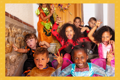 Group of kids in various Halloween costumes.