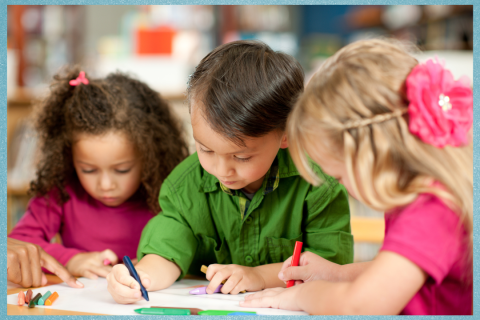 Children coloring on paper.