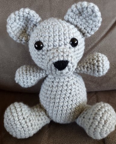 Image is a gray crochet amigurumi mouse.