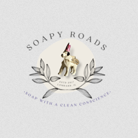 Soapy Roads logo, a dog wearing a party hat over a leafy embellishment with the business name arching over the top.