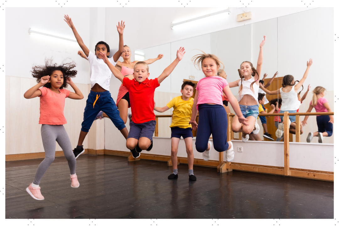 Kids dancing and jumping.